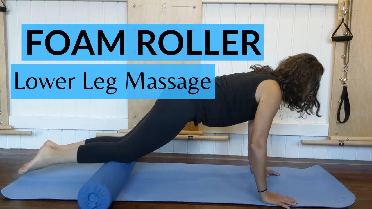 Picture of a woman using a foam roller to massage her lower legs.