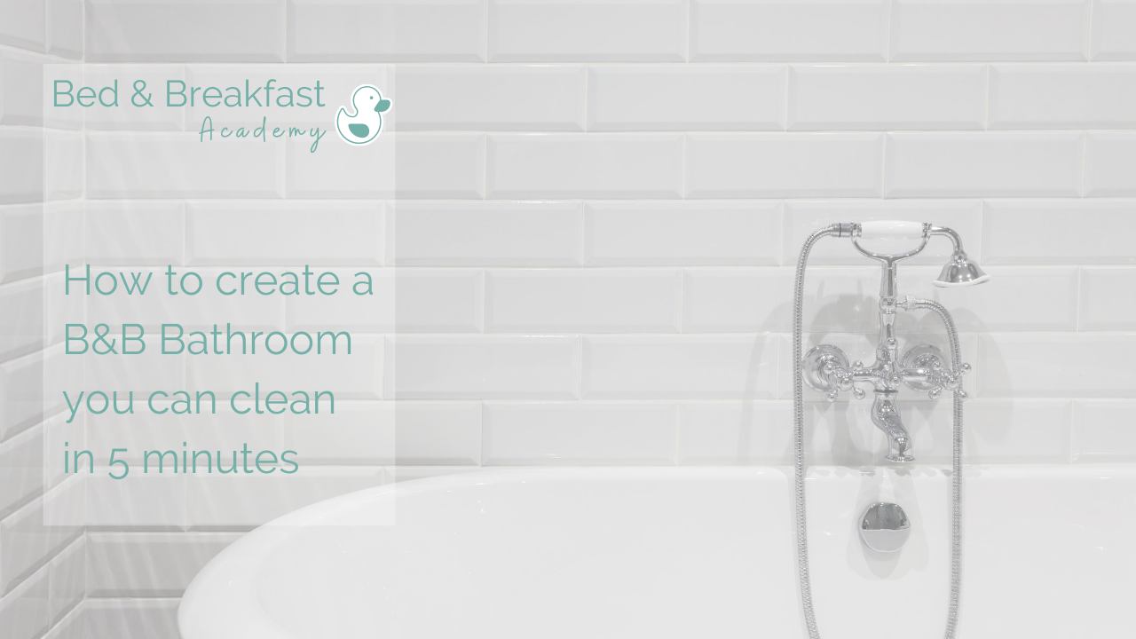 How to create a bathroom you can clean in 5 minutes | white freestanding bath in white tiled bathroom