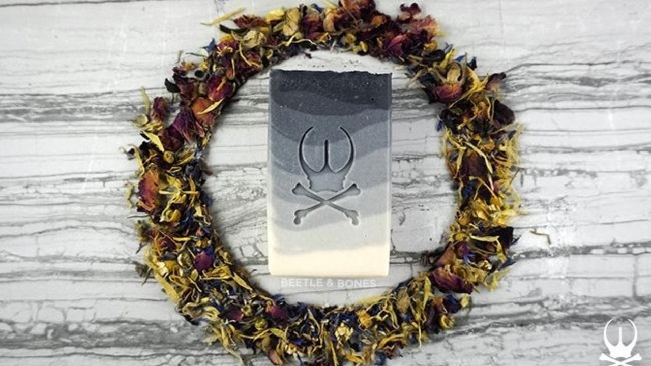 bar of sandalwood ombre soap within a wreath