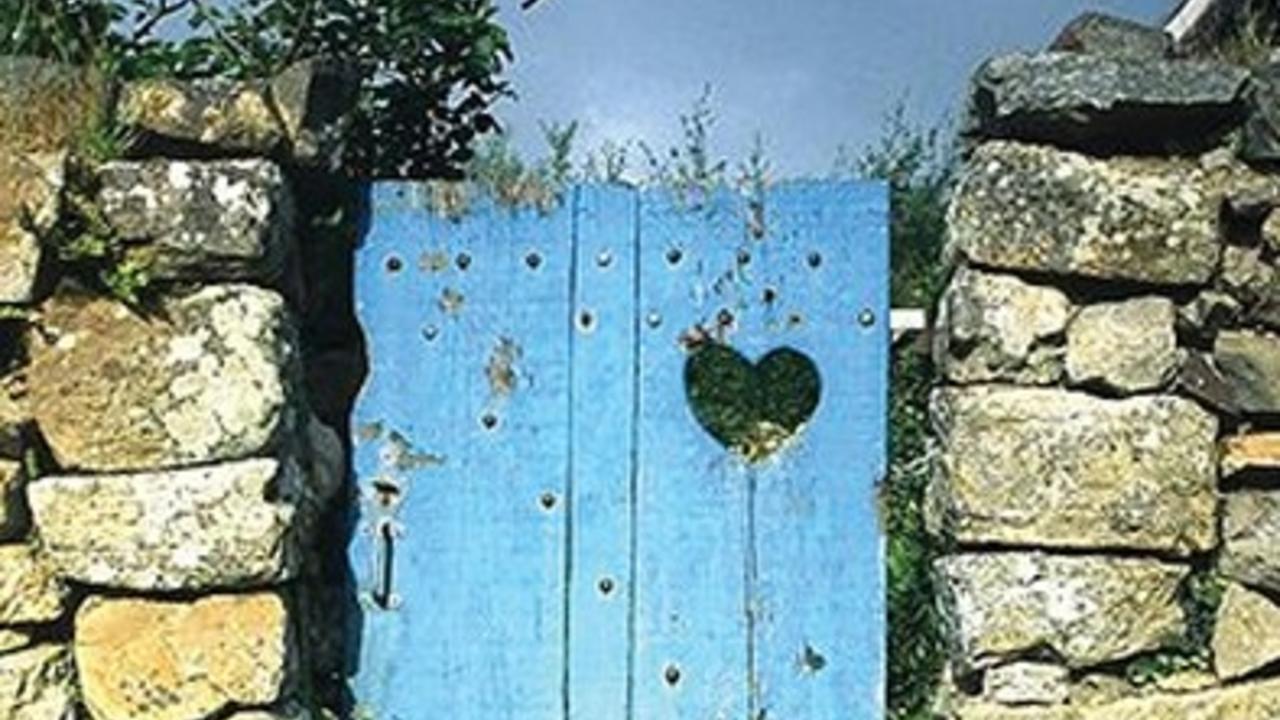 heart carved into gate