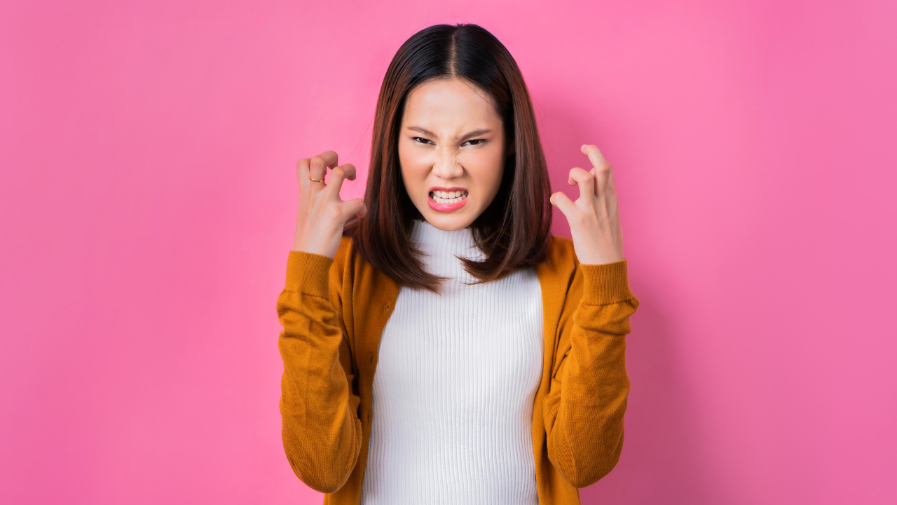 Woman getting angry to represent being triggered and getting angry and frustrated with the triggers