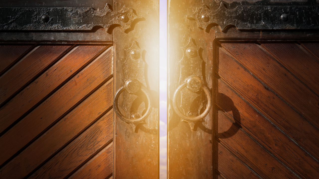A closed door with light streaming through it ready to open - when your purpose comes knocking, answer the door!