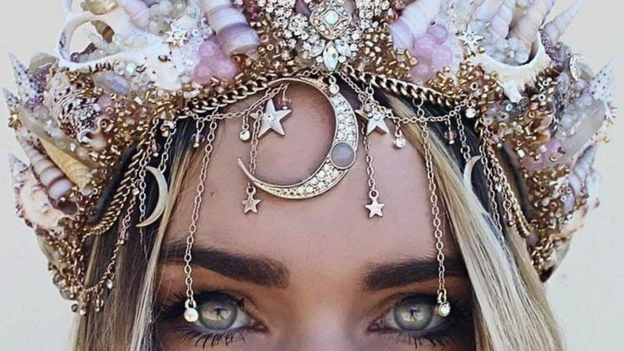 Priestess woman wearing crown of shells, moon and stars - remembering who you are and your unique soul's truth