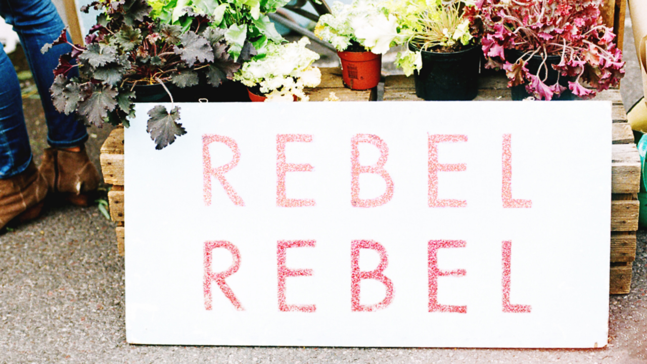 Rebel Rebel board sign - the art of not giving a fuck and being true to yourself especially as a spiritual soul-led entrepreneur and rebelpreneur