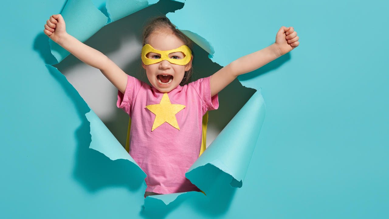 Child in superhero outfit bursting out of the wall - Play In Your Playground First So Your Soul Family Know How To Find You - Leanne Juliette