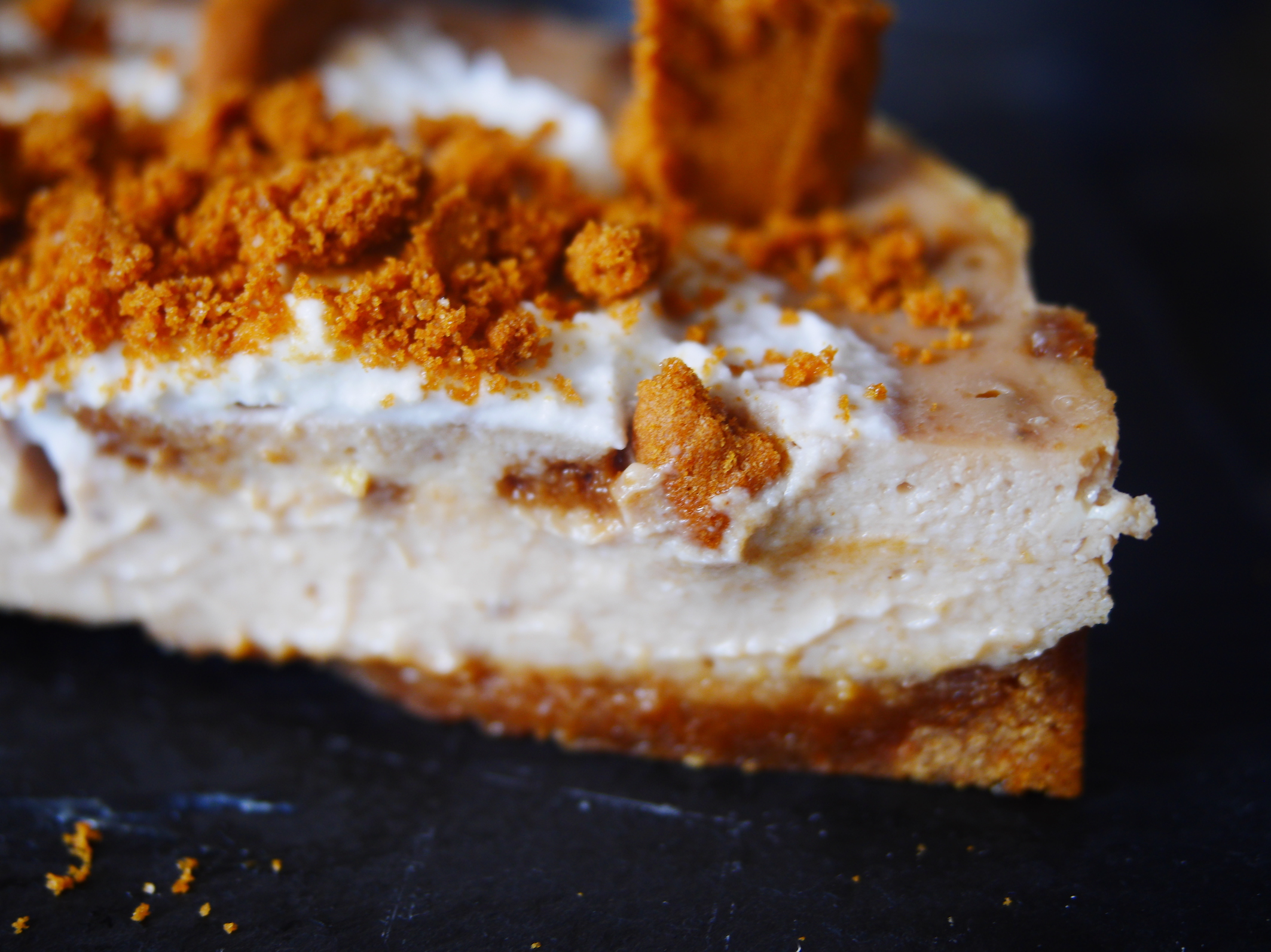 Vegan Biscoff tofu cheesecake topped with Biscoff cookies