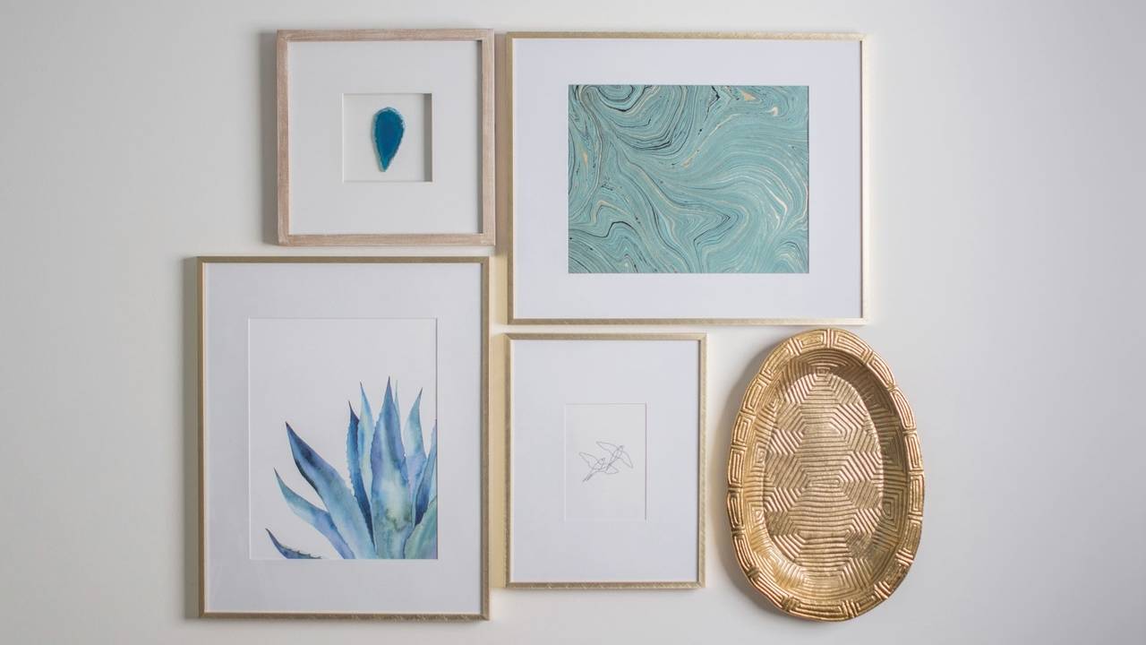 A Guide for knowing what to hang above your sofa and how to execute.