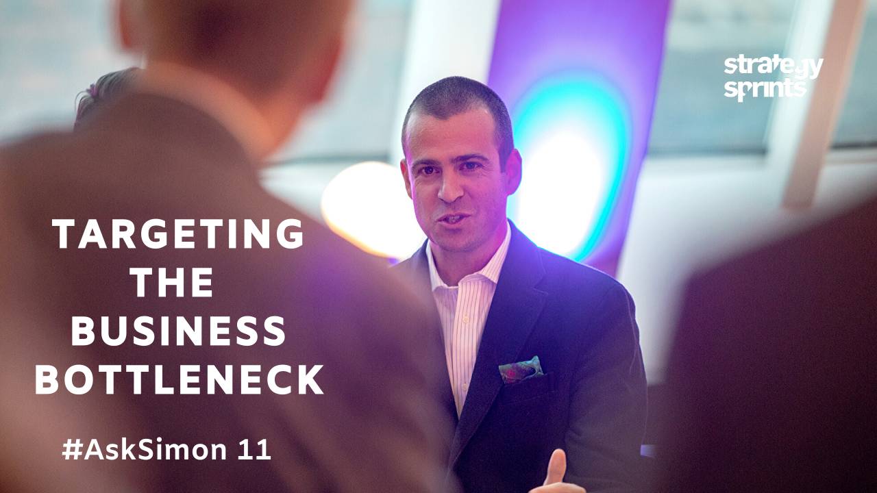 Focusing on a bottleneck in a business. Define bottleneck in business