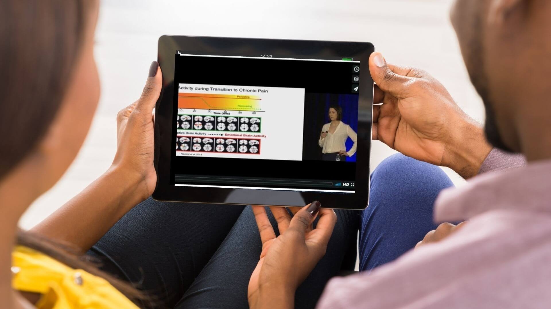 woman man holding ipad watching video