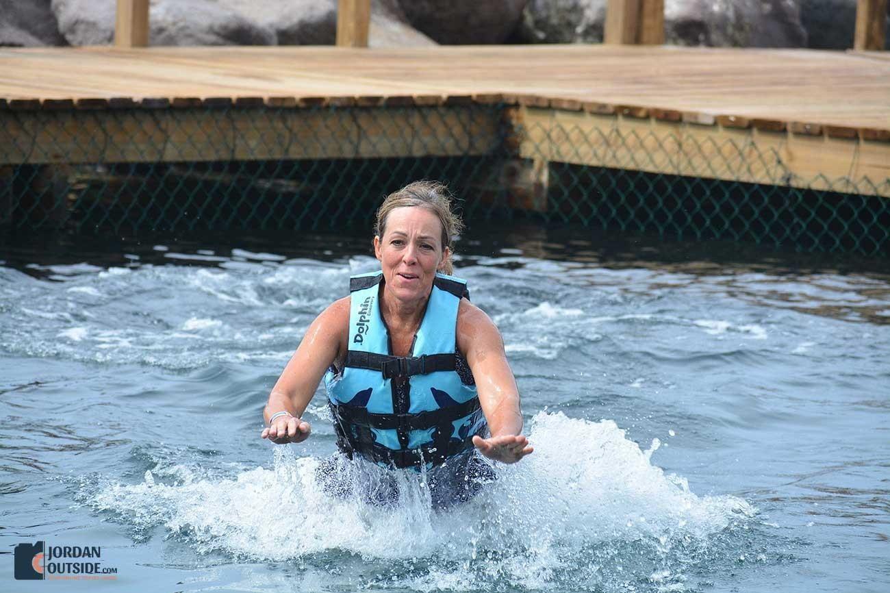 Julie being pushed by Dolphins