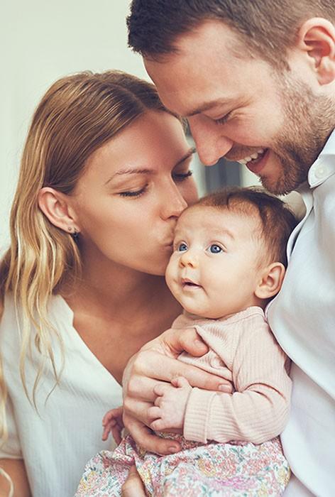 Husband and Wife with baby Daughter