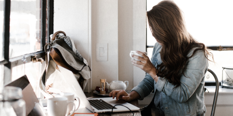 Woman Typing a Blog