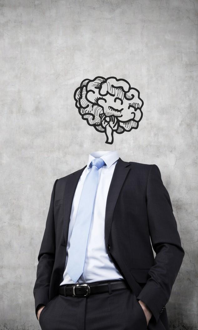 Business man without head and a drawing of a brain instead