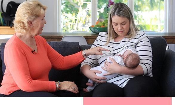 Dr Robyn Thompson Helps A Mother Breastfeed her baby
