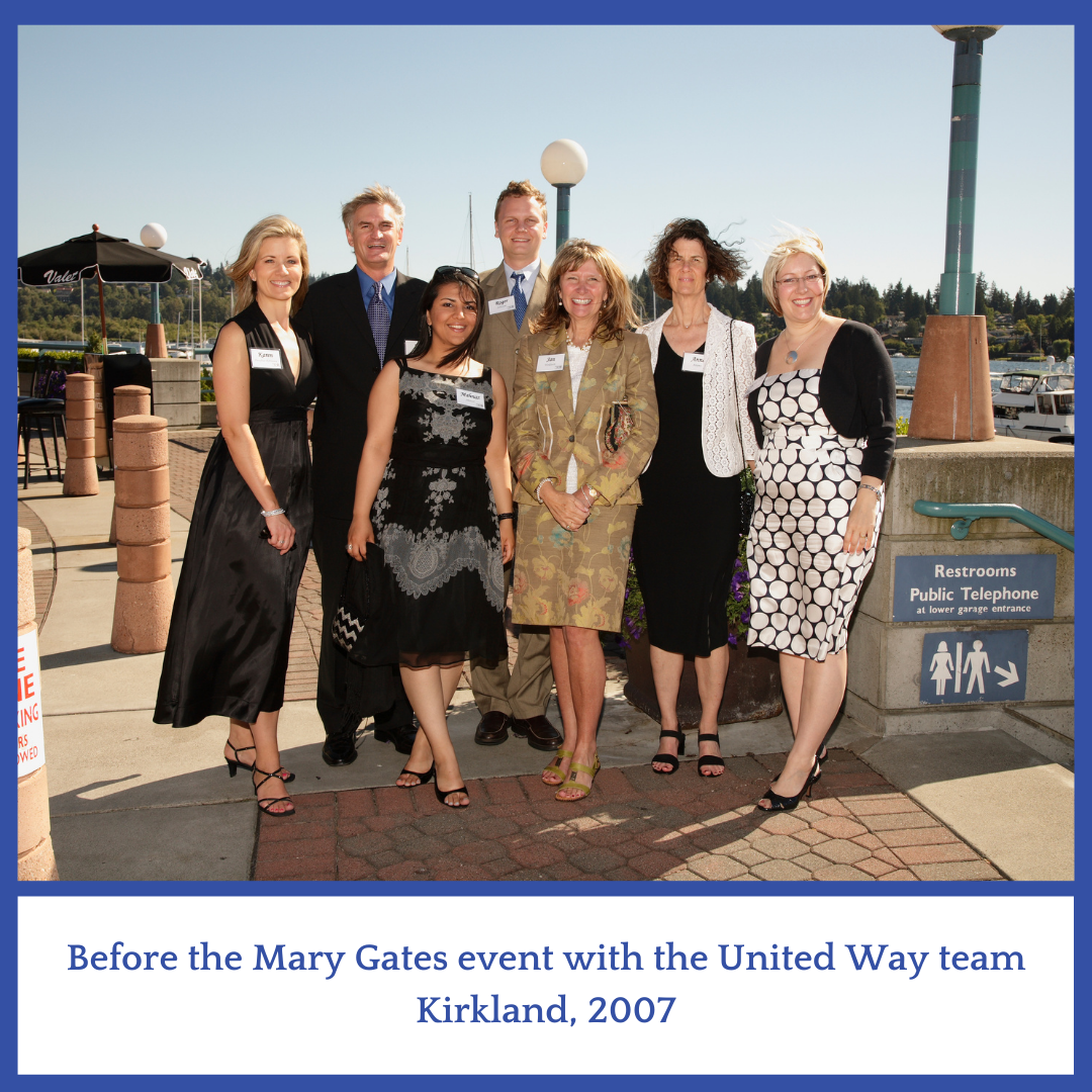 Group of 7 people at a boat launch in Kirkland