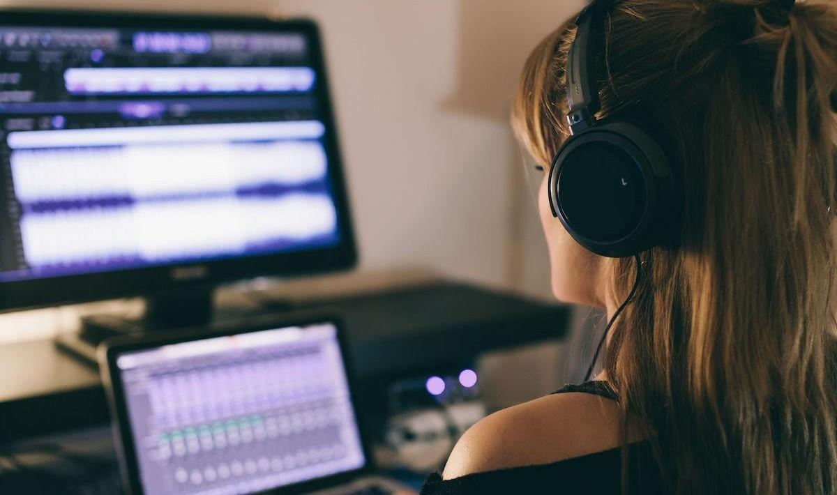 image of woman in recording studio