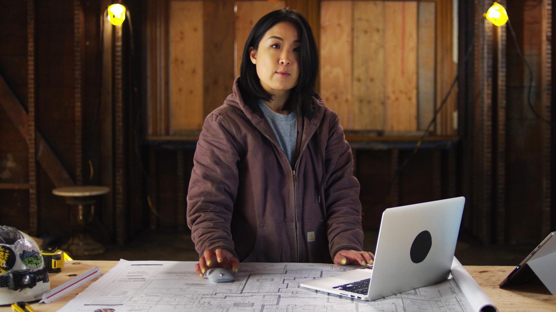Construction Teacher in Blueprints Class