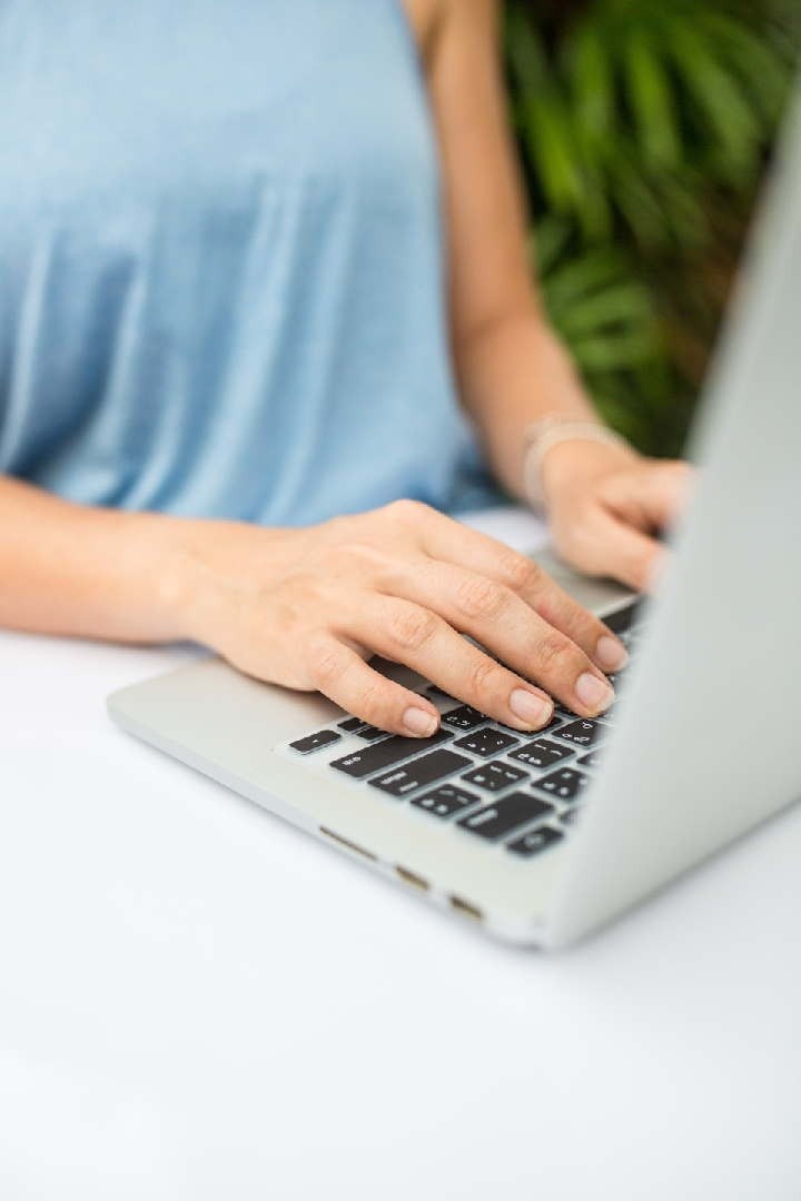 Professional on laptop casual