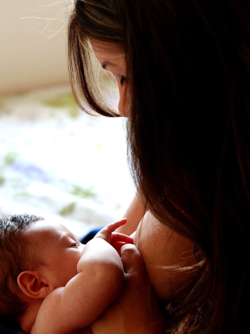 Woman breastfeeding baby