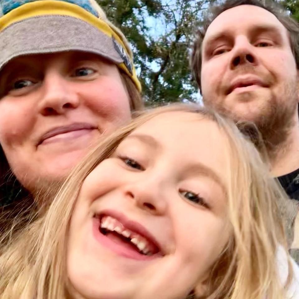 herbalist Melissa Mutterspaugh with her daughter and partner in the woods