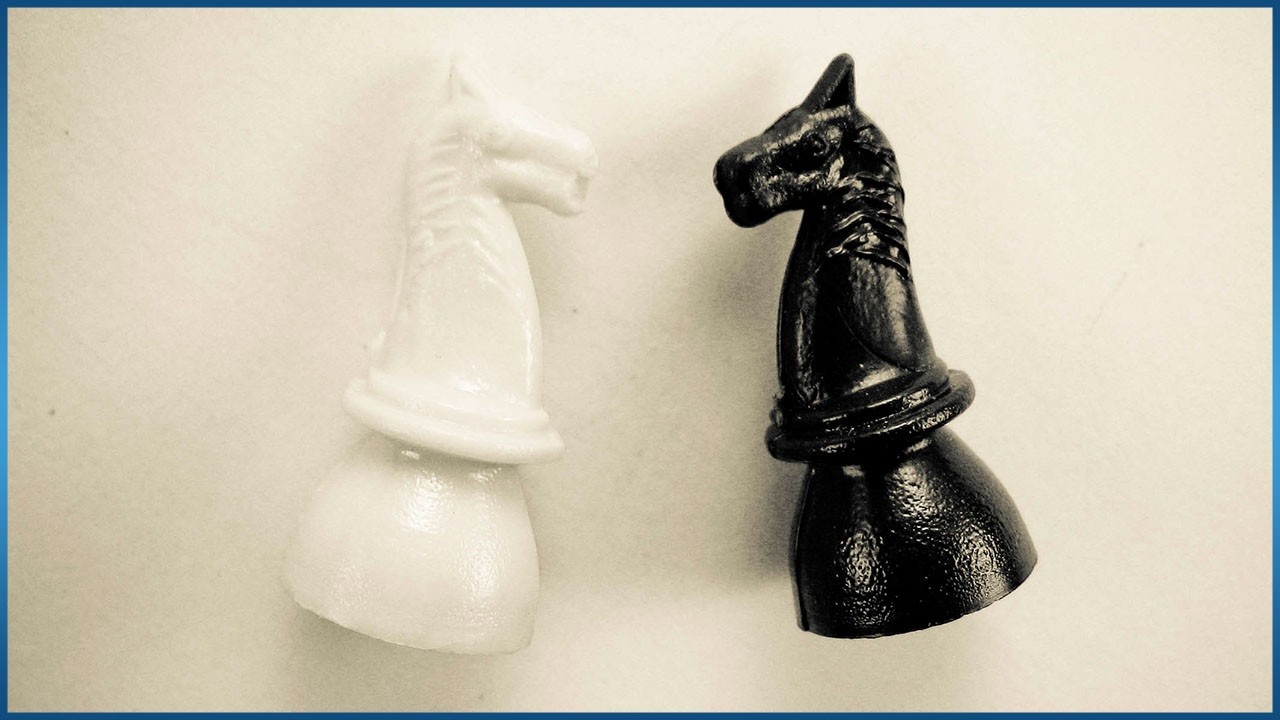 black and white Knight chess pieces